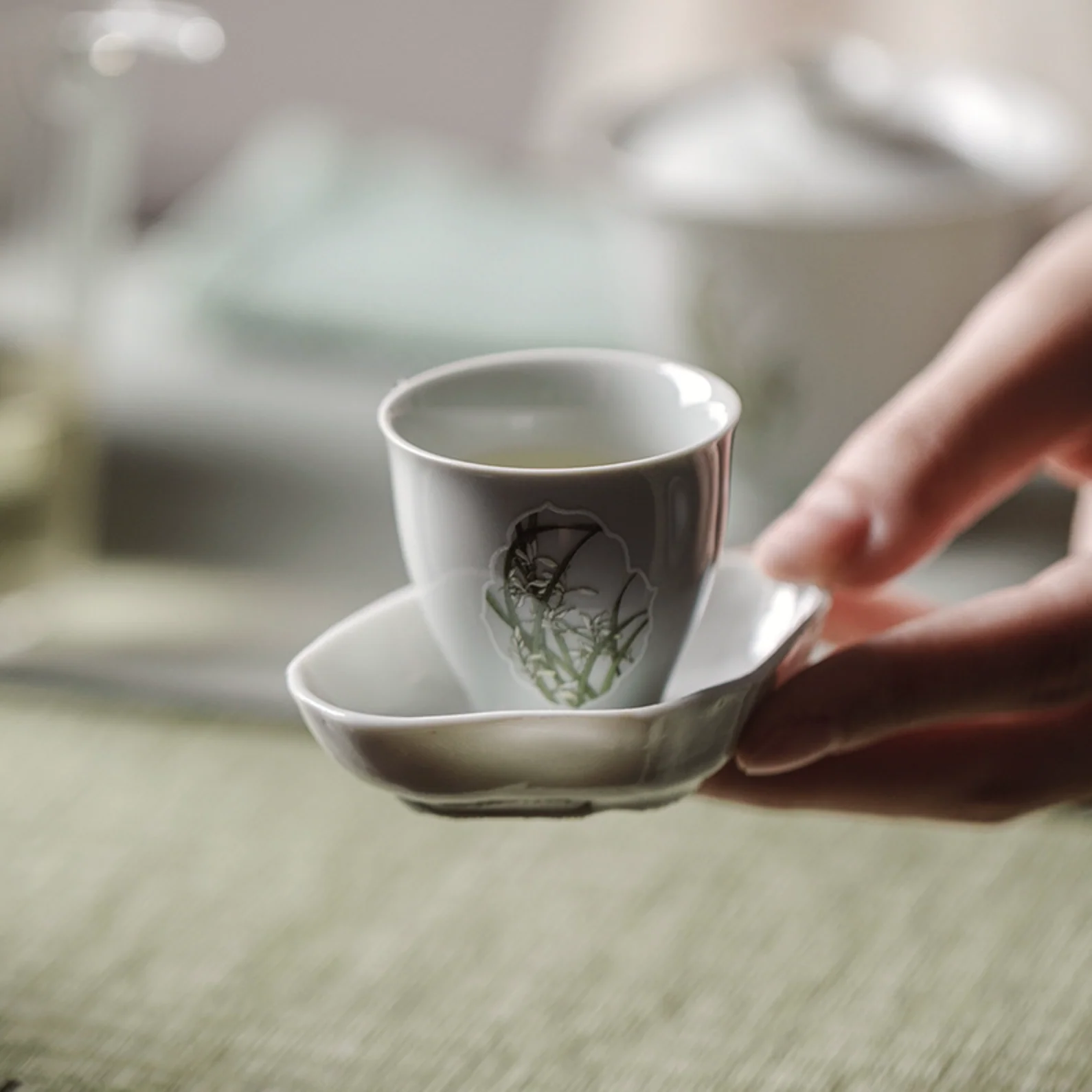 Gu Qing Porcelain Window Orchid Tea Cup - Image 3